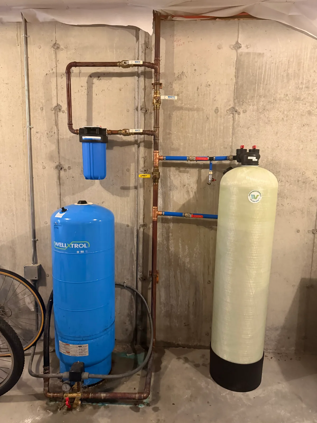 MV Filtration treatment tank with copper piping and pressure tank